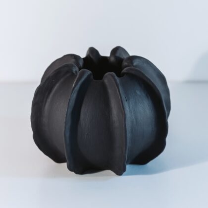 small ridged ceramic vase